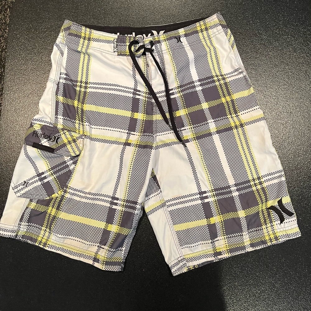 Hurley Board Shorts. Size 30. Plaid with white,  gray and yellow.